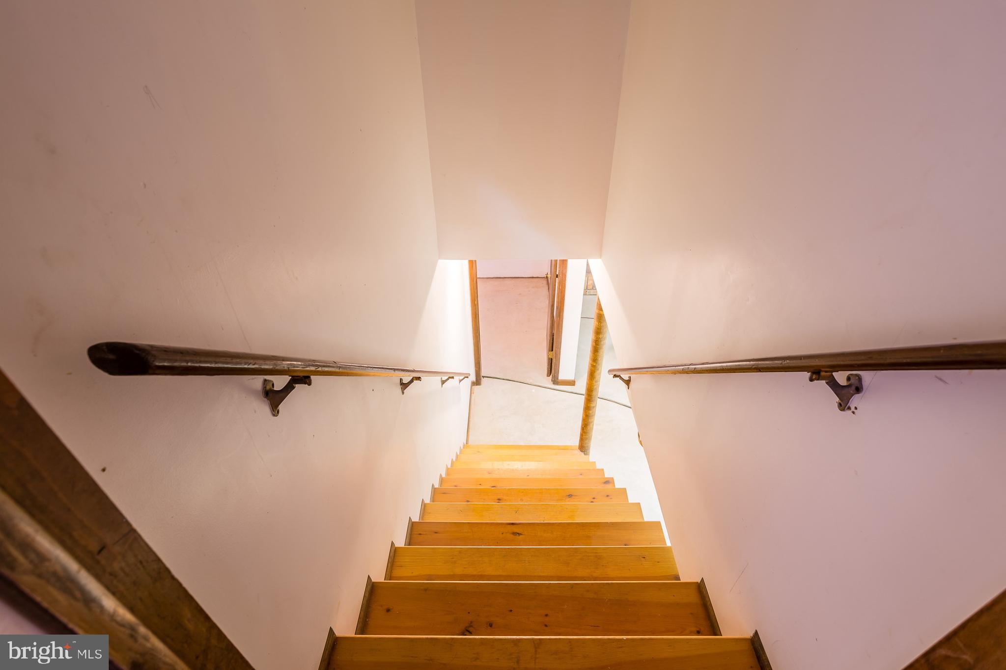 22650 Dorman Road Lewes, DE 19958 - Photo 14 of 33 Interior stairs to basement