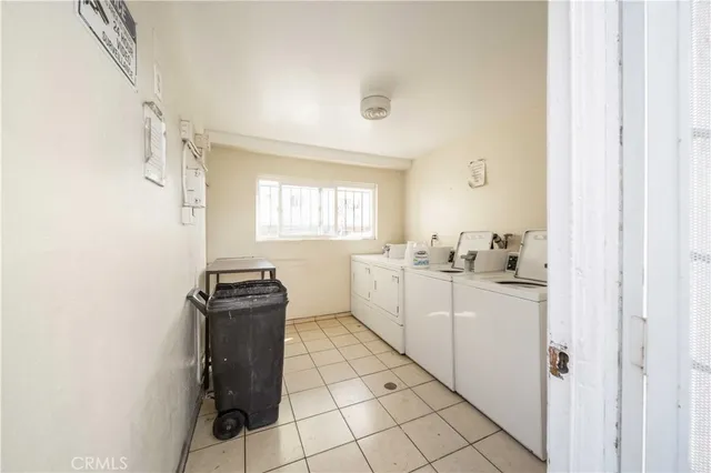 a kitchen with a sink cabinets and window
