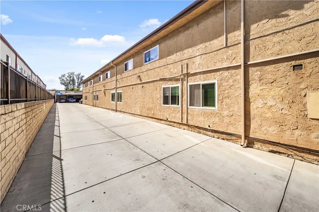 a view of multiple house with a street