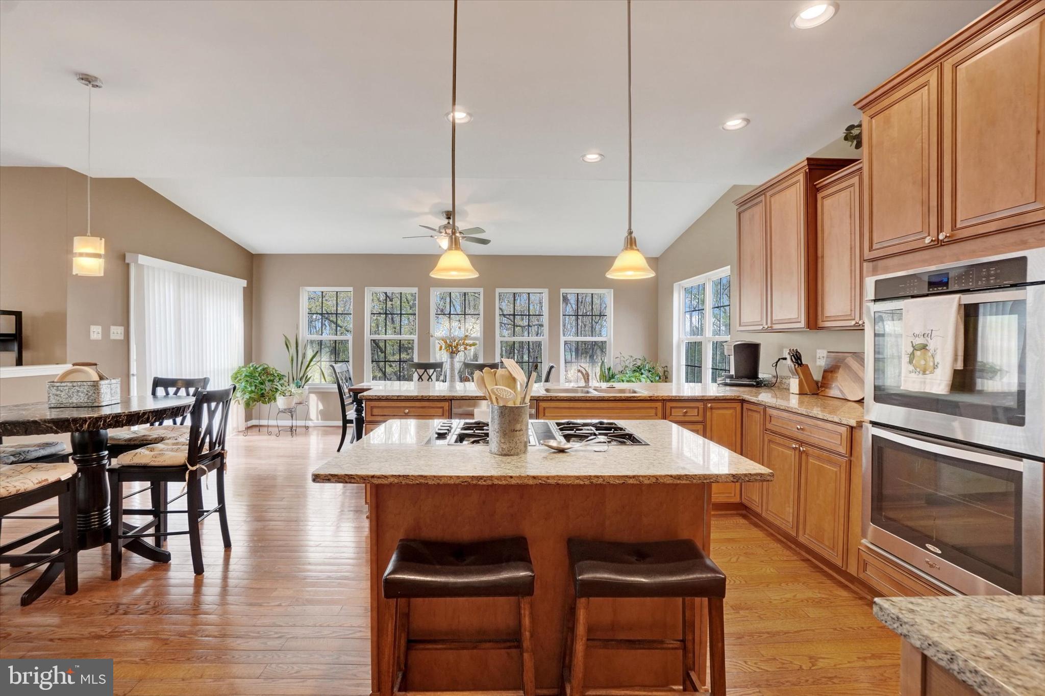 1015 Nugent Way York, PA 17402 - Photo 16 of 46 a large kitchen with a table and chairs