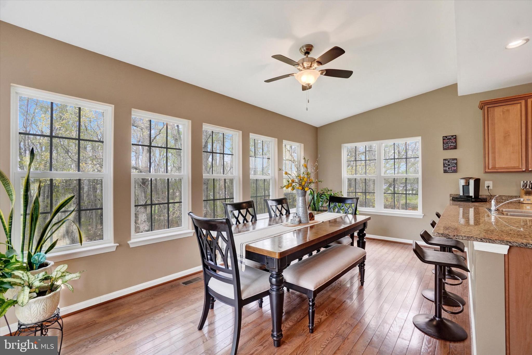 1015 Nugent Way York, PA 17402 - Photo 17 of 46 a view of a dining room with furniture window and wooden floor