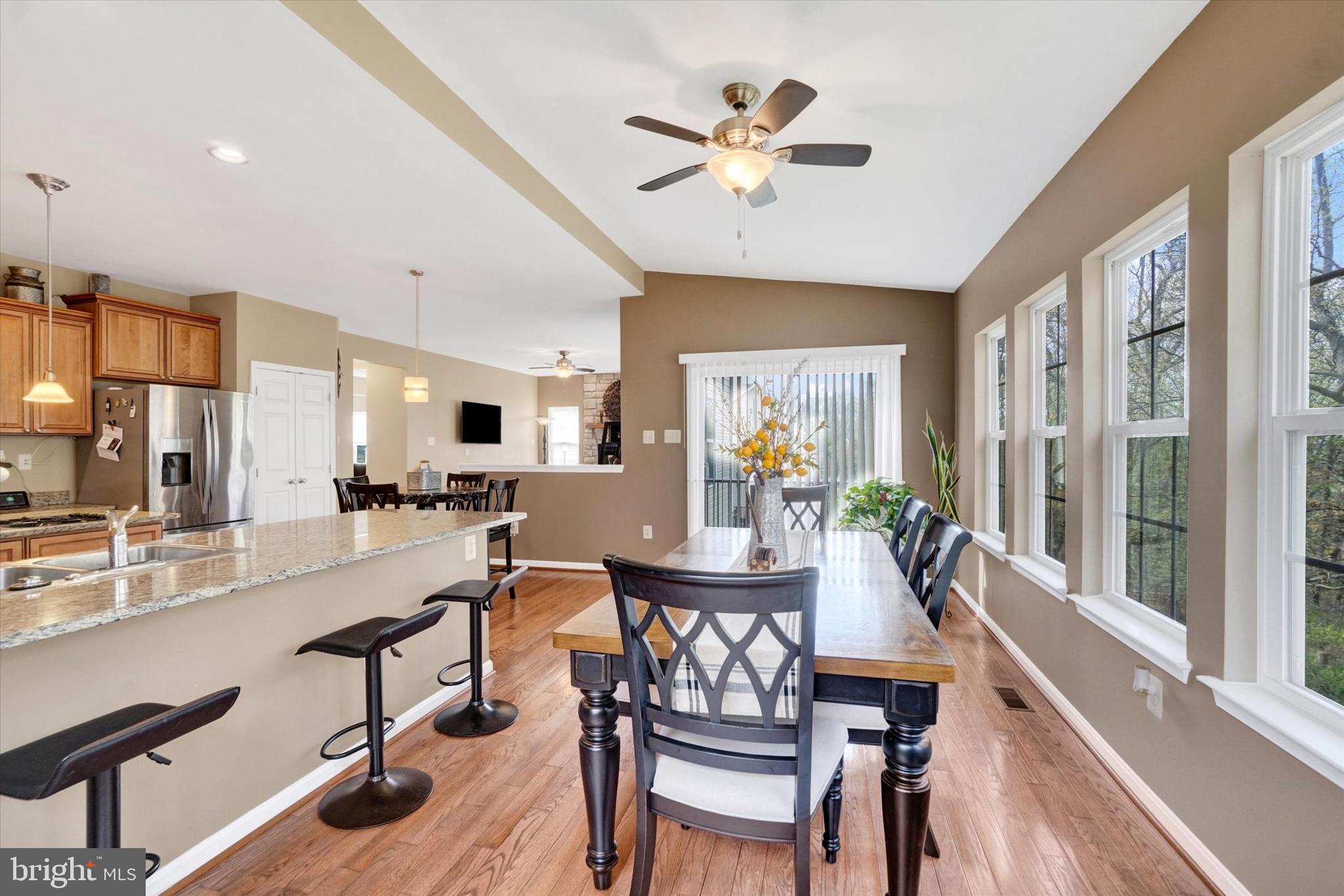 1015 Nugent Way York, PA 17402 - Photo 18 of 46 a view of a dining room with furniture window and wooden floor