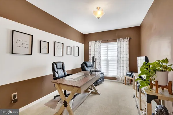 a view of a livingroom with furniture