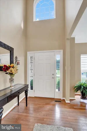 a room with furniture and wooden floor