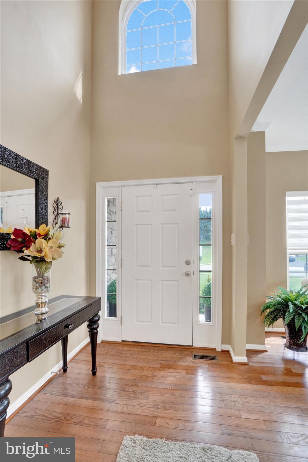 1015 Nugent Way York, PA 17402 - Photo 4 of 46 a room with furniture and wooden floor