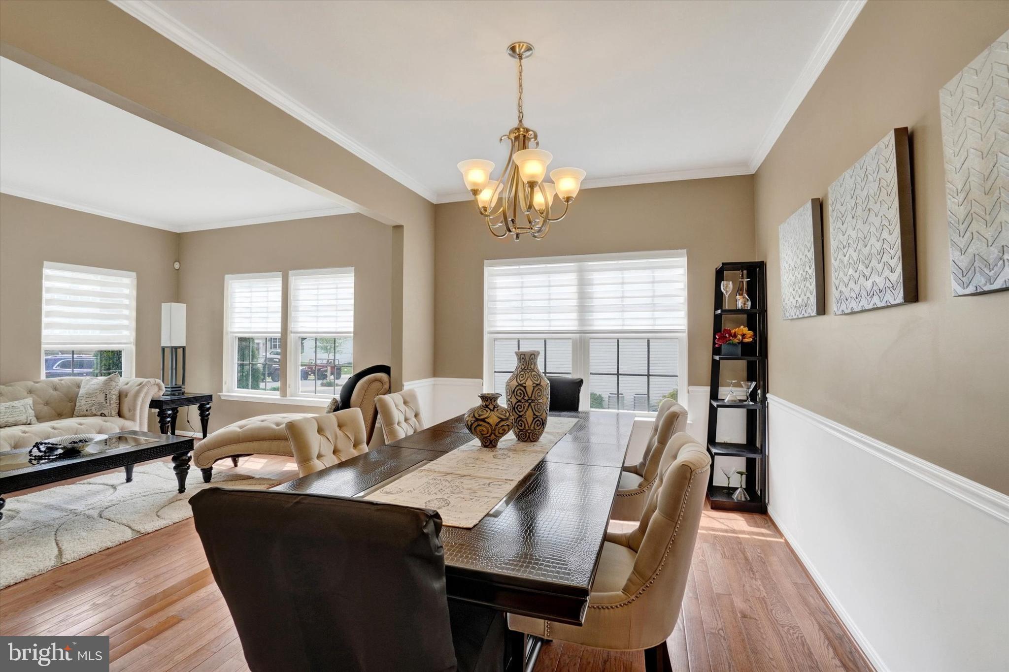 1015 Nugent Way York, PA 17402 - Photo 8 of 46 a view of a dining room with furniture window and outside view