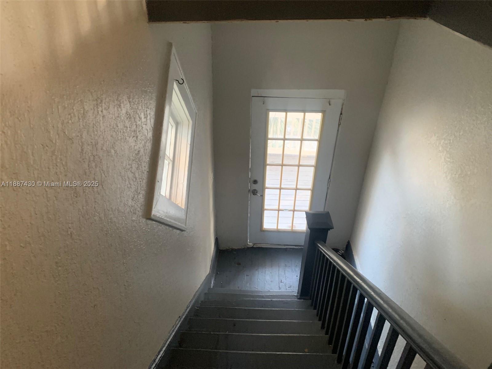 1129 Grothe Street Jacksonville, FL 32209 - Photo 21 of 21 a view of a hallway with wooden floor and staircase