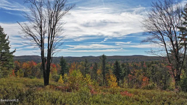 a view of mountain view with mountains in the background