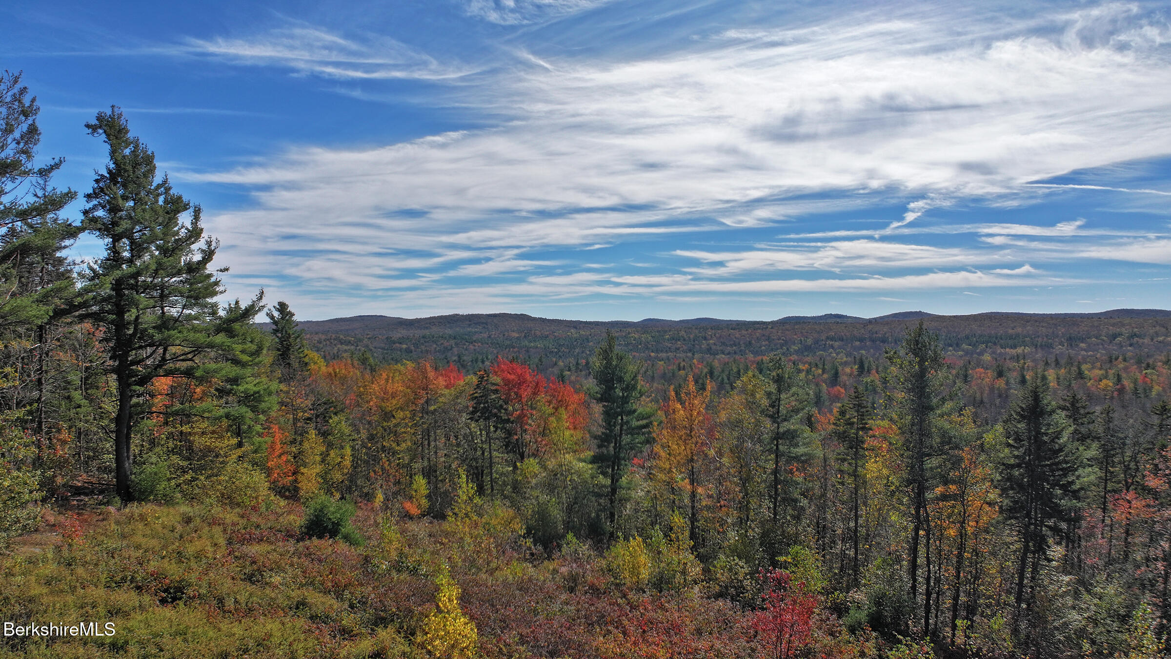 1570 B Washington Mountain Road Washington, MA 01223 - Photo 5 of 11 a view of a city with mountains in the background