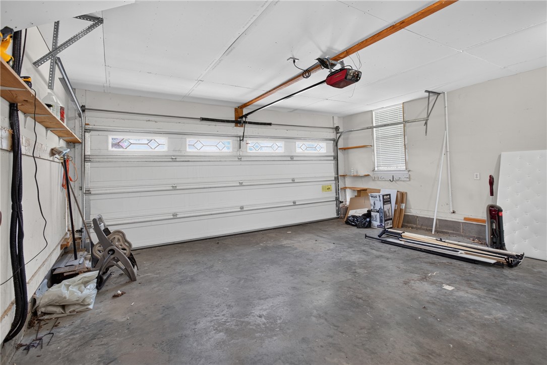 612 Providence Point Drive Seneca, SC 29678 - Photo 31 of 43 A well-maintained garage offers ample storage and direct access for vehicles.