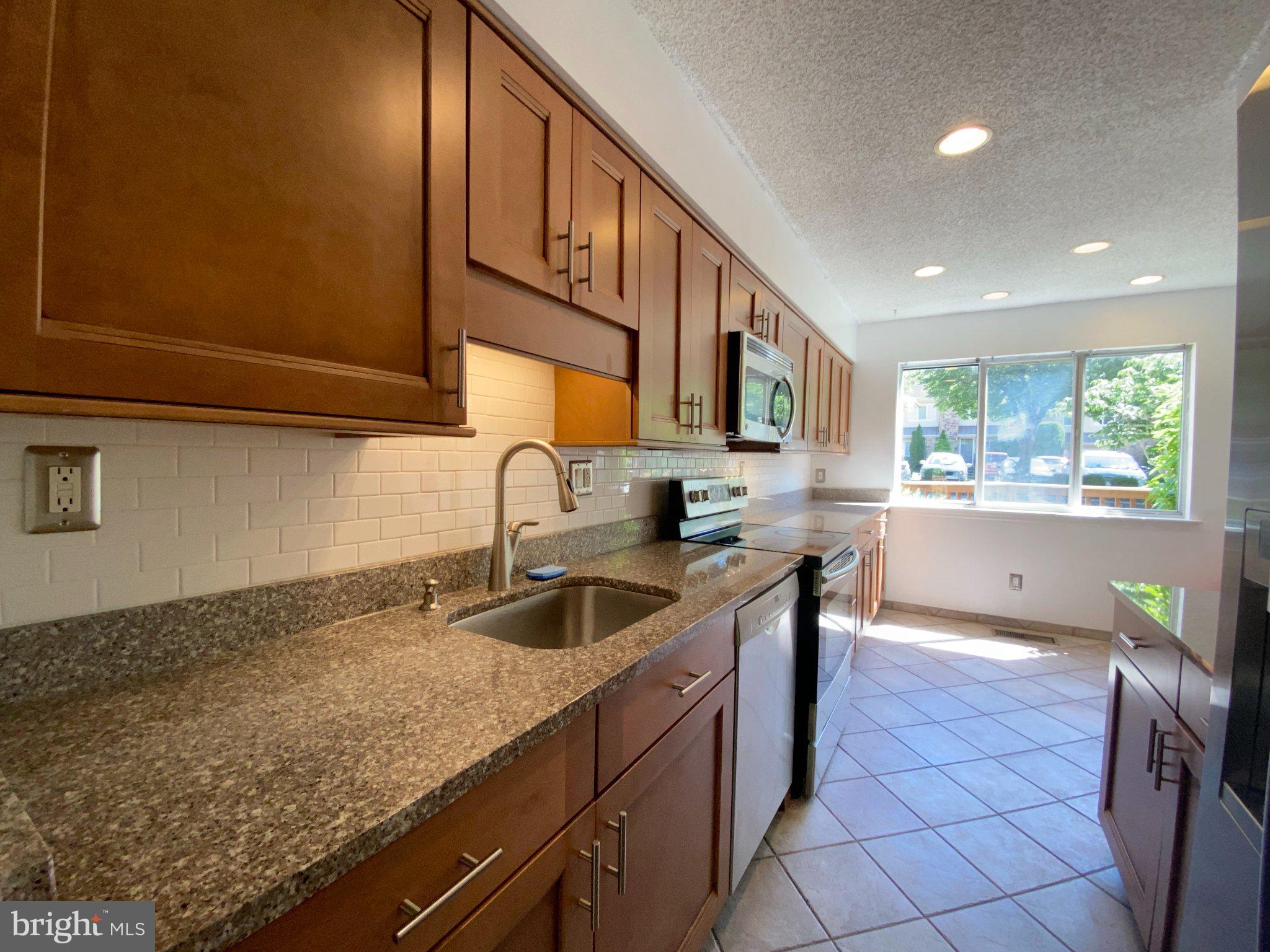 326 Brigade Court Chesterbrook, PA 19087 - Photo 48 of 48 Bright and inviting modern kitchen.