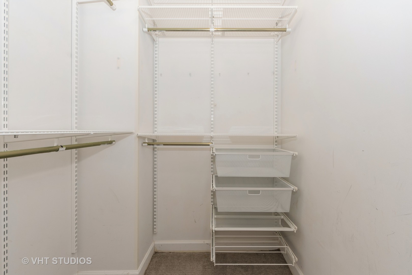 1600 South Prairie Avenue, Unit 2005 Chicago, IL 60616 - Photo 7 of 12 a view of walk in closet with empty racks