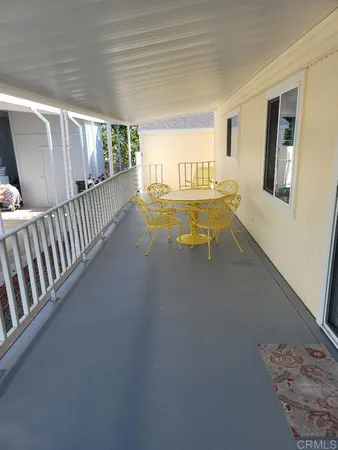 a view of a hallway with staircase