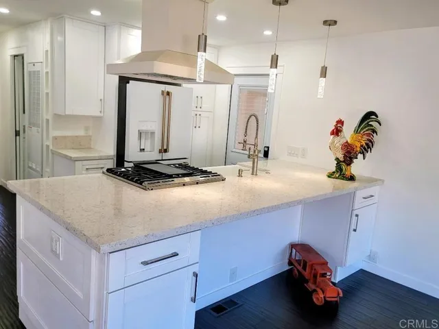 a bathroom with a sink double vanity and a mirror