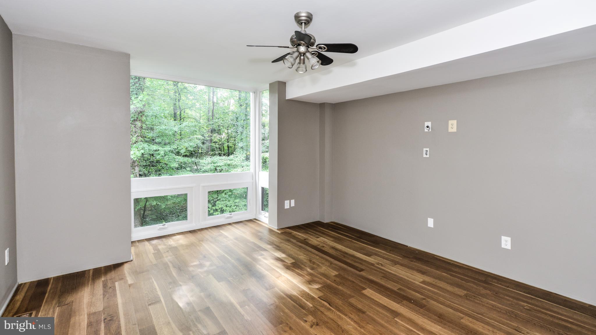 11533 Hickory Cluster Reston, VA 20190 - Photo 19 of 30 a view of an empty room with a window