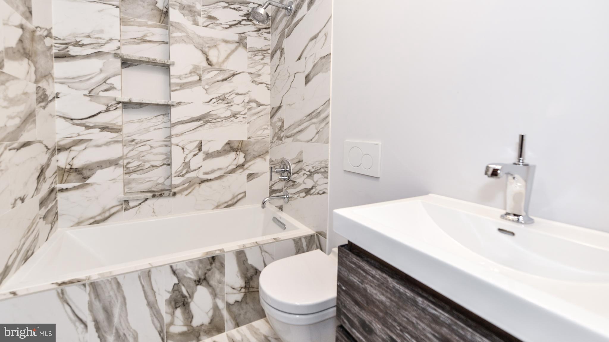 11533 Hickory Cluster Reston, VA 20190 - Photo 23 of 30 a bathroom with a sink and a toilet