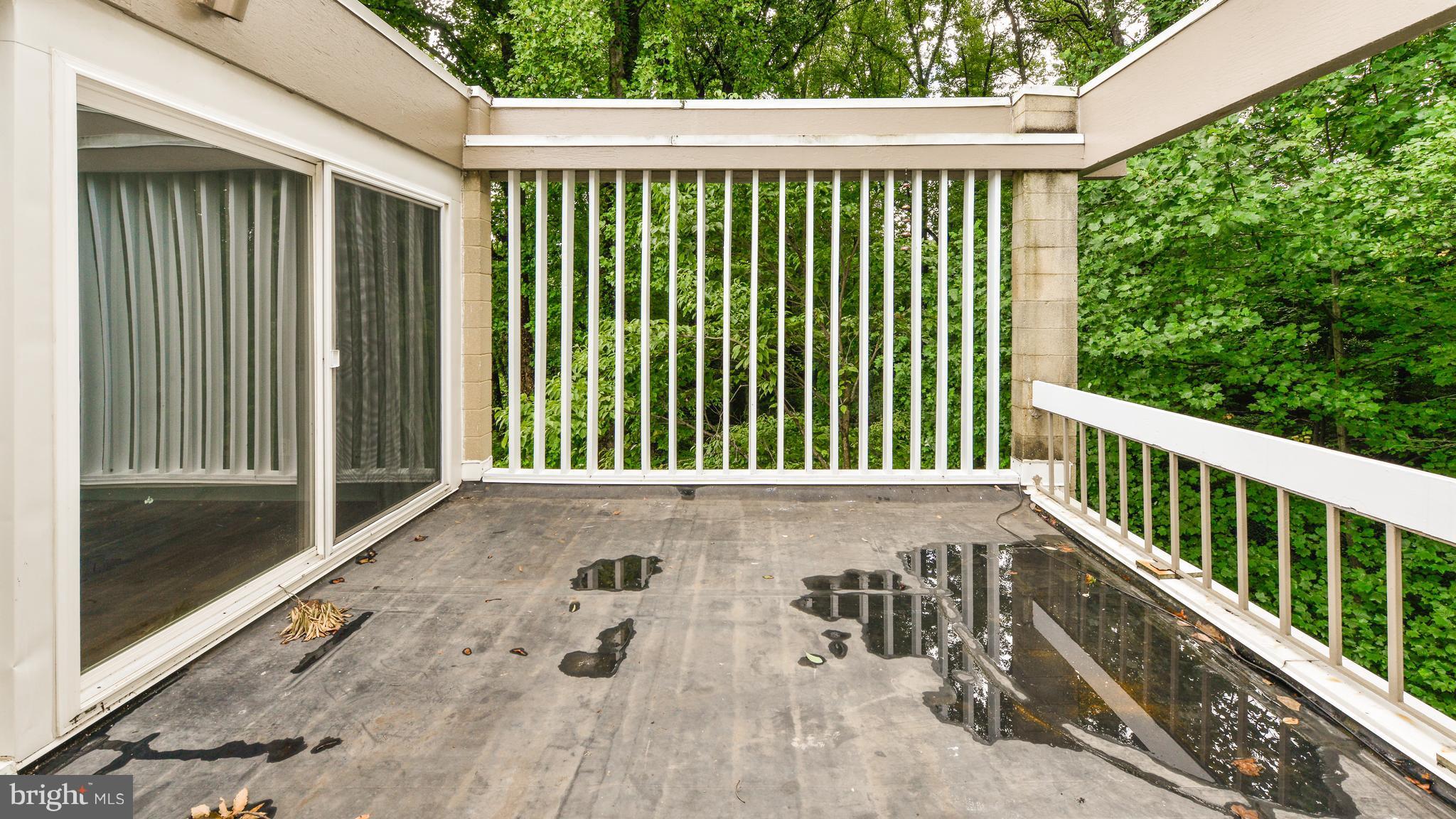 11533 Hickory Cluster Reston, VA 20190 - Photo 24 of 30 a view of a garden from a balcony