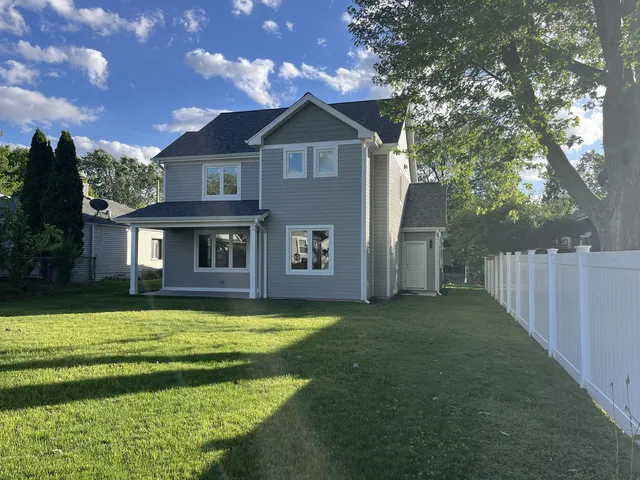 a view of a house with a swimming pool