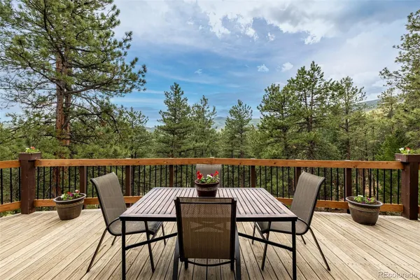 a view of balcony with furniture and stove