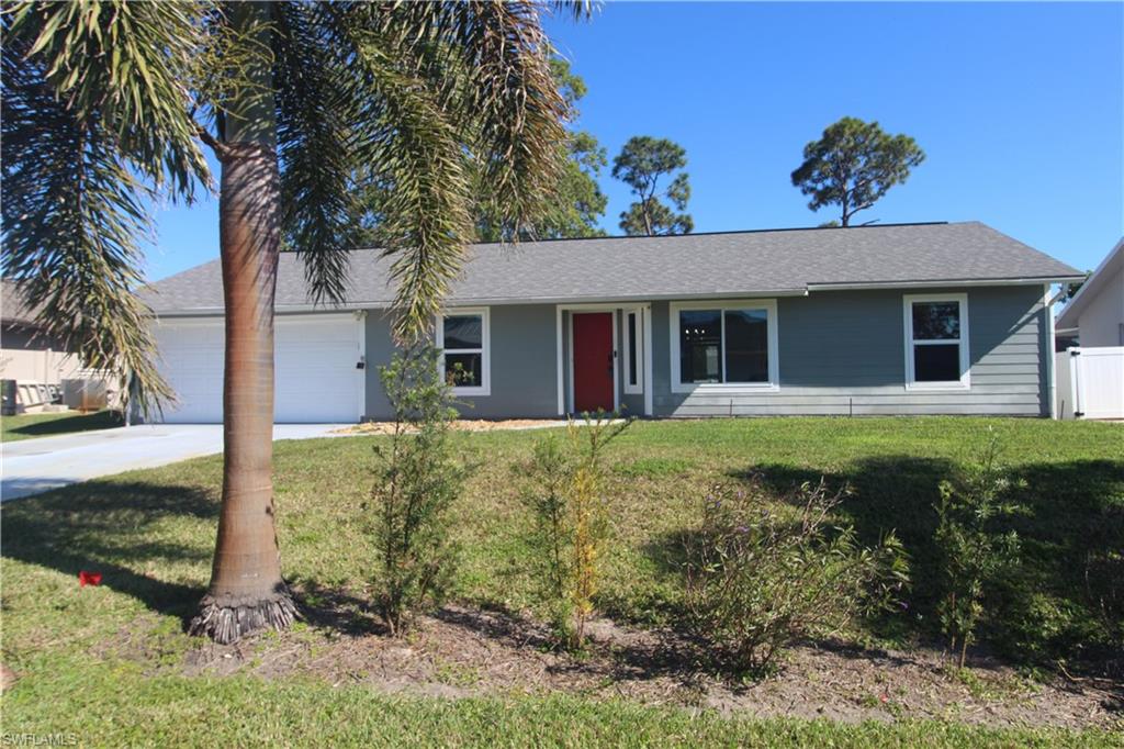 18257 Sycamore Road Fort Myers, FL 33967 - Photo 14 of 19 Ranch-style house with a garage and a front yard