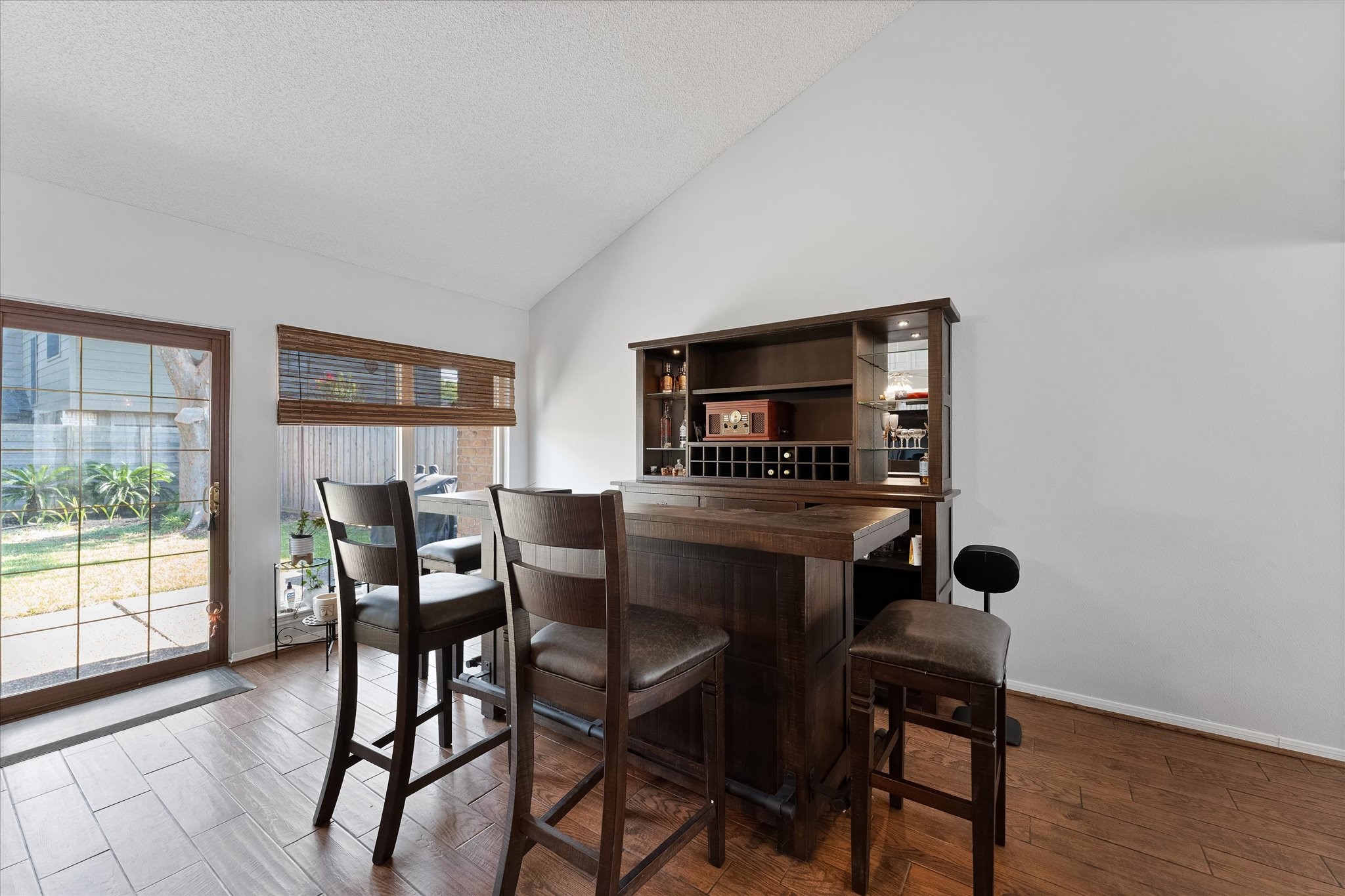 11854 Briar Forest Drive Houston, TX 77077 - Photo 10 of 21 a dining room with furniture and wooden floor