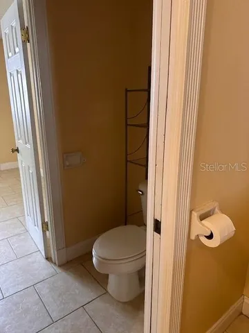 a bathroom with a toilet