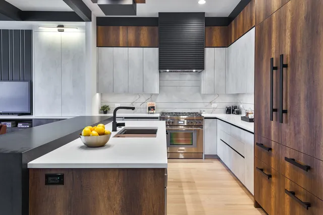 a kitchen with a sink a counter and cabinets