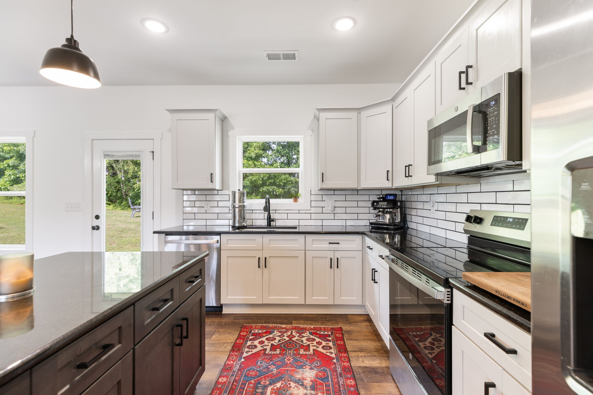 1578 Angus Way Greenbrier, TN 37073 - Photo 18 of 45 a kitchen with stainless steel appliances granite countertop a sink stove and cabinets