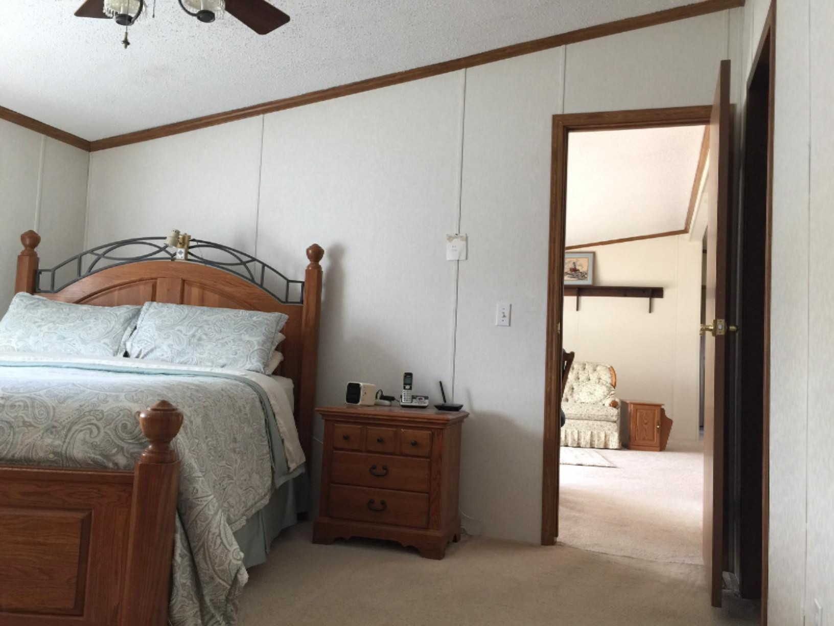 8924 East Roosevelt Road Holton, MI 49425 - Photo 12 of 14 Master Bedroom into Living Room