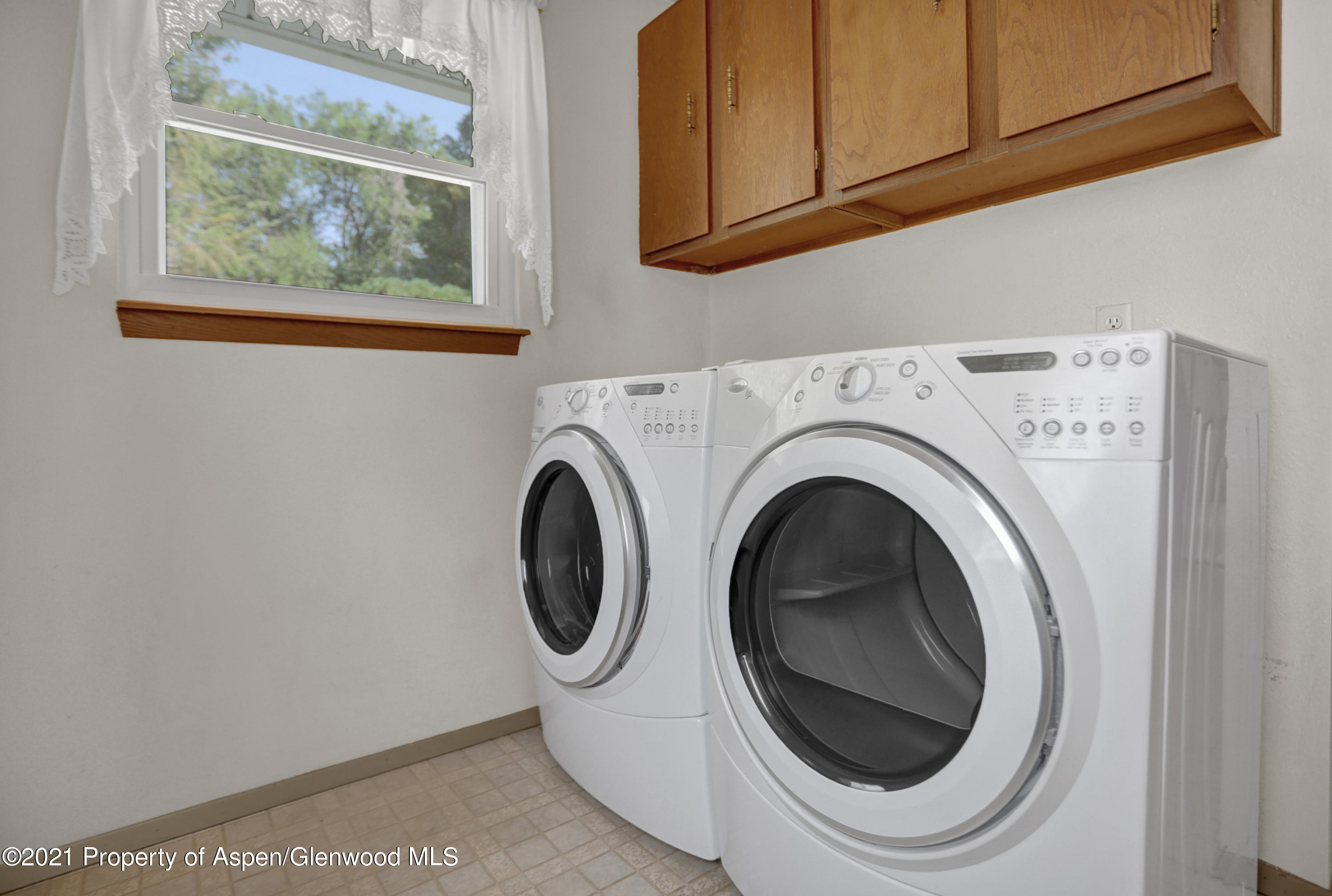 770 Bridger Circle Craig, CO 81625 - Photo 12 of 32 a utility room with dryer and washer