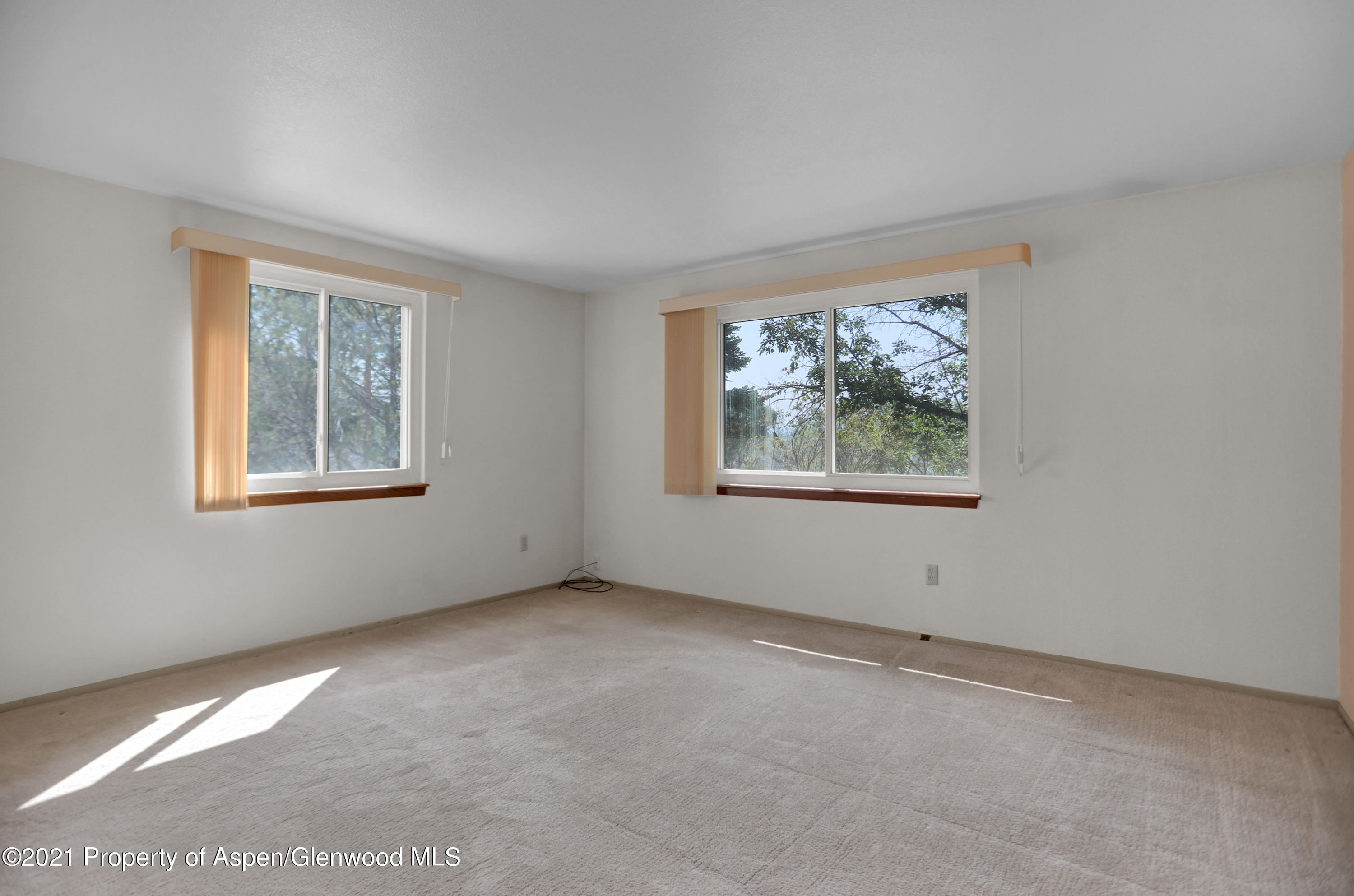 770 Bridger Circle Craig, CO 81625 - Photo 14 of 32 an empty room with windows