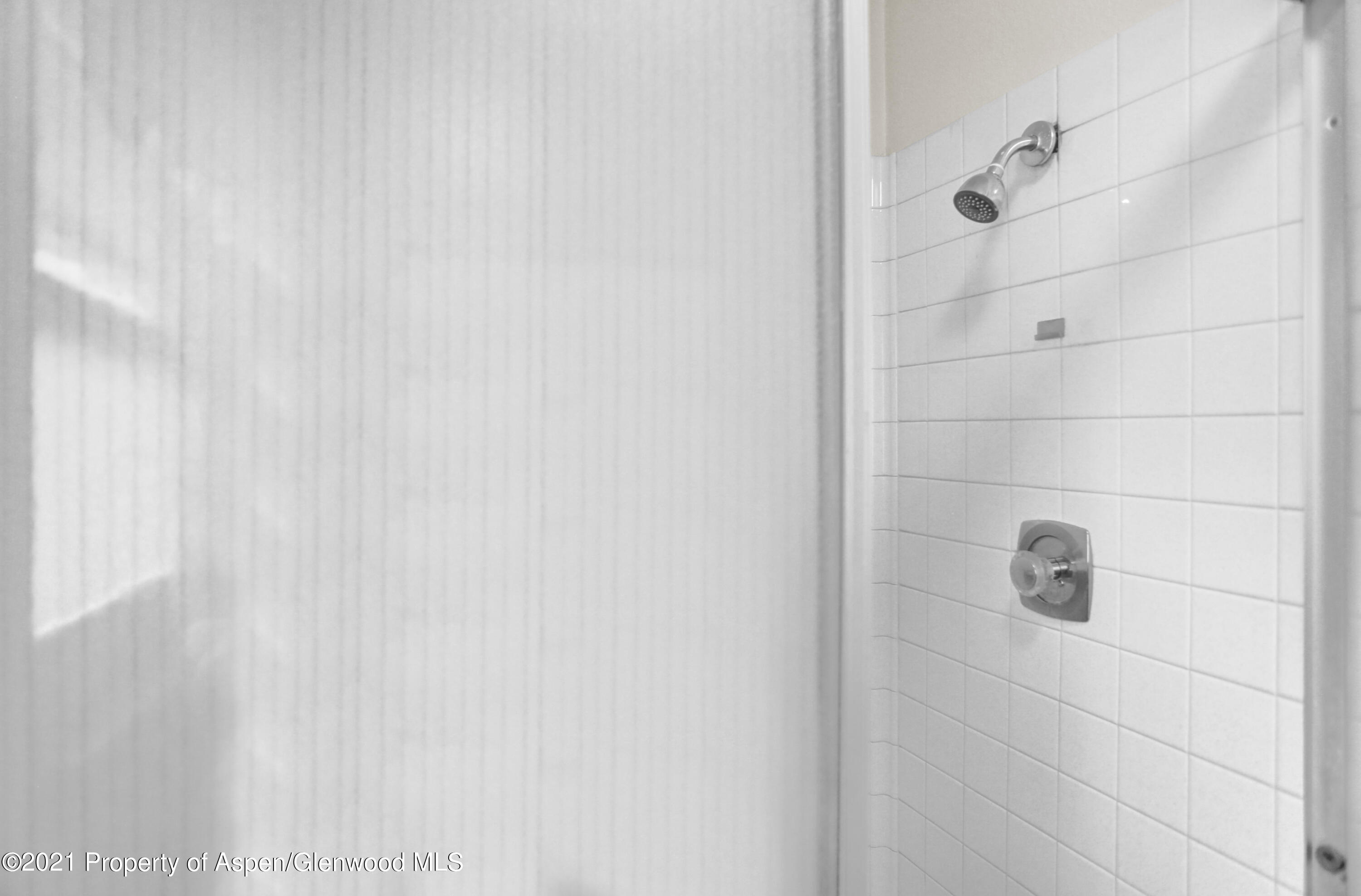 770 Bridger Circle Craig, CO 81625 - Photo 17 of 32 a bathroom with a shower