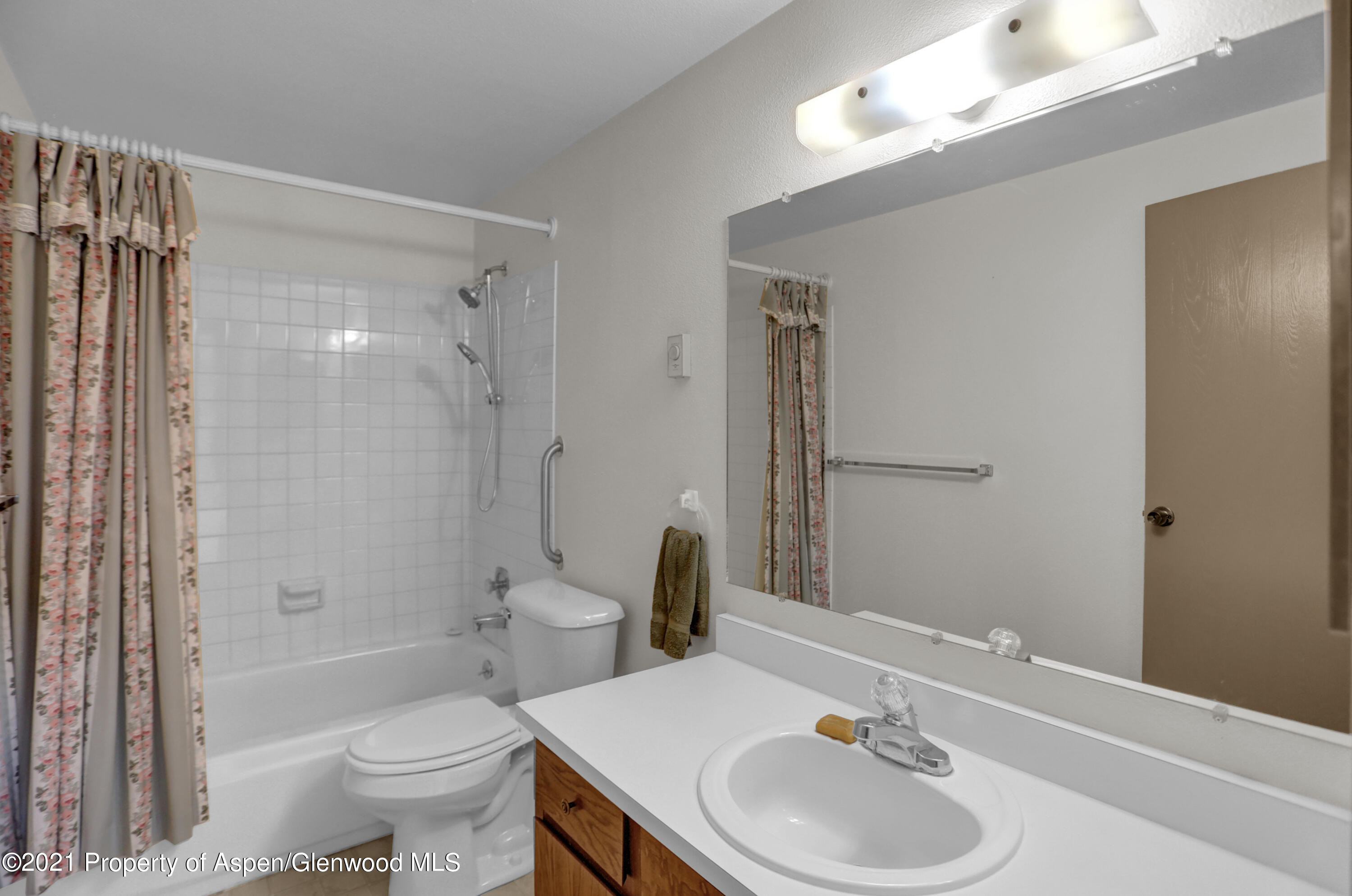 770 Bridger Circle Craig, CO 81625 - Photo 20 of 32 a bathroom with a sink toilet and shower