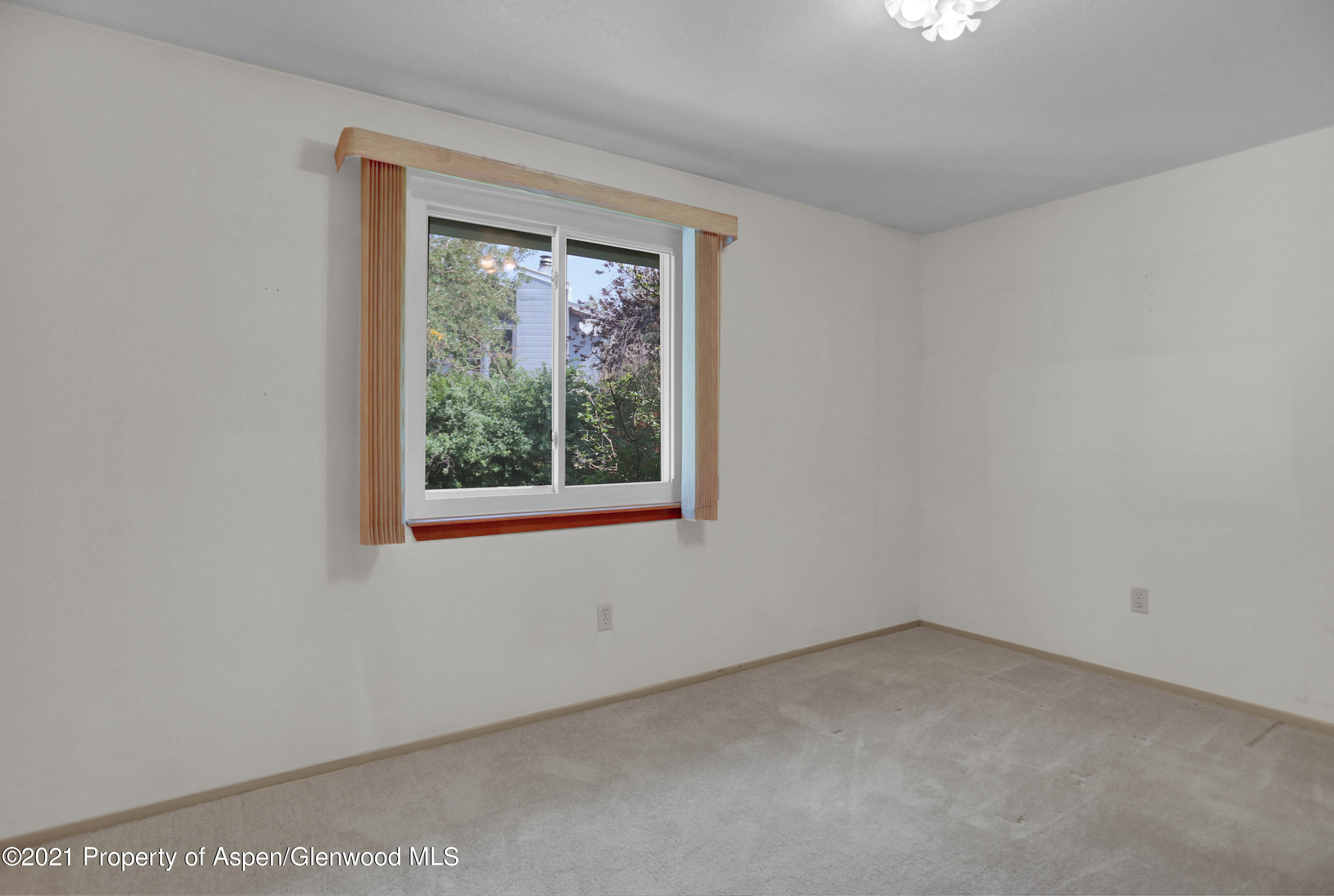 770 Bridger Circle Craig, CO 81625 - Photo 22 of 32 an empty room with a window