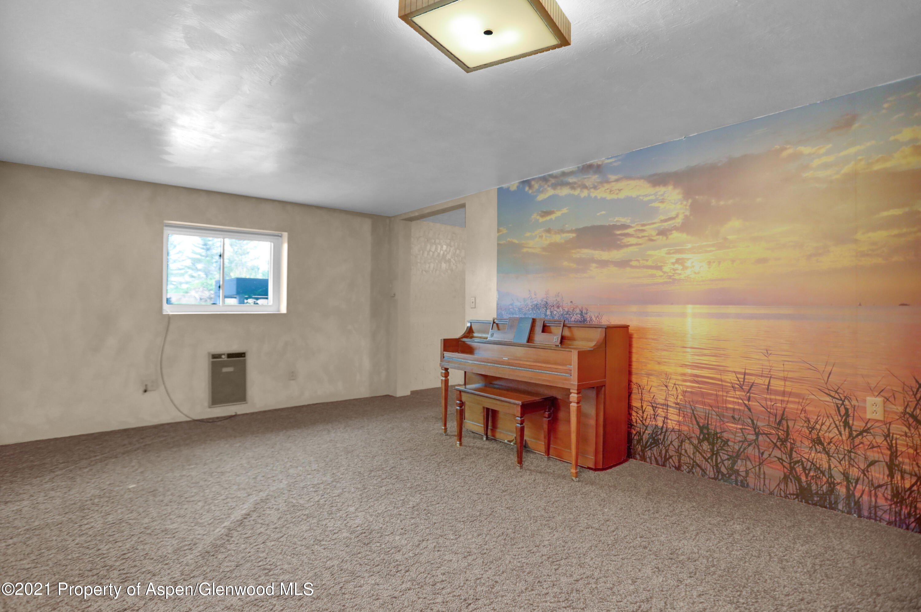 770 Bridger Circle Craig, CO 81625 - Photo 24 of 32 a view of a room with furniture and a chandelier