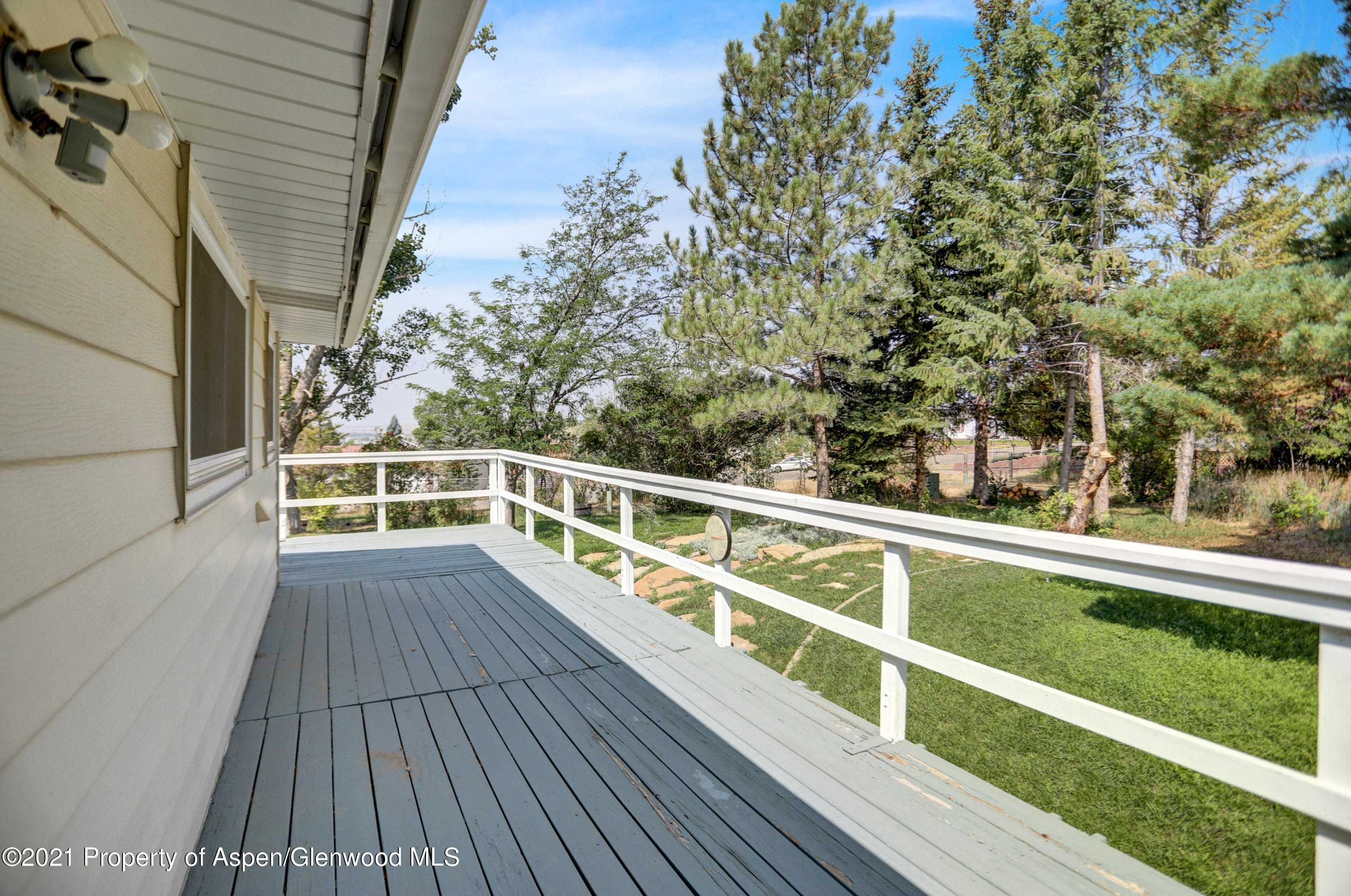 770 Bridger Circle Craig, CO 81625 - Photo 28 of 32 a view of balcony with wooden floor and fence