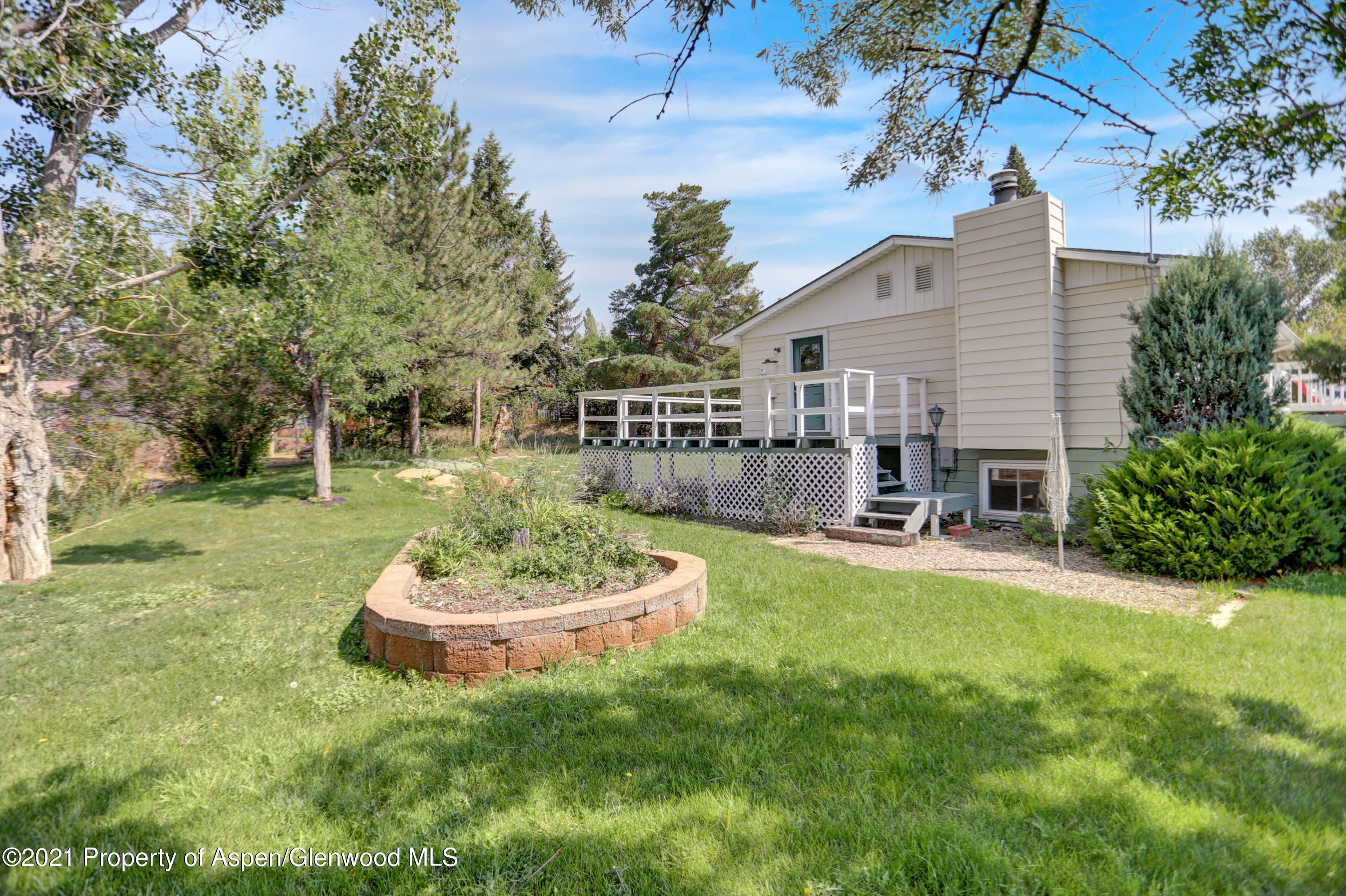 770 Bridger Circle Craig, CO 81625 - Photo 29 of 32 a swimming pool with outdoor seating and yard