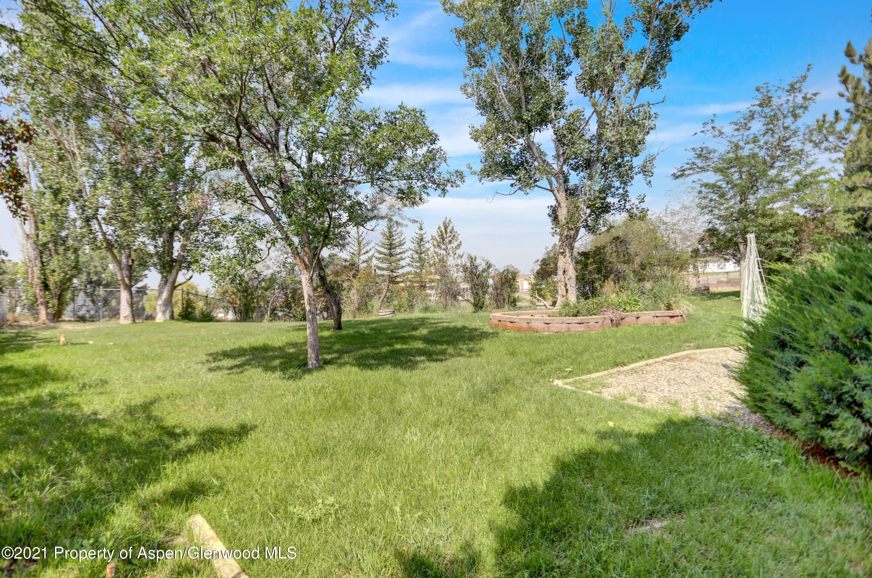 770 Bridger Circle Craig, CO 81625 - Photo 30 of 32 a view of yard with trees
