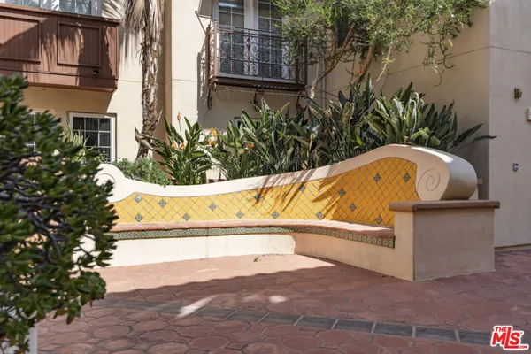 a view of swimming pool with outdoor seating