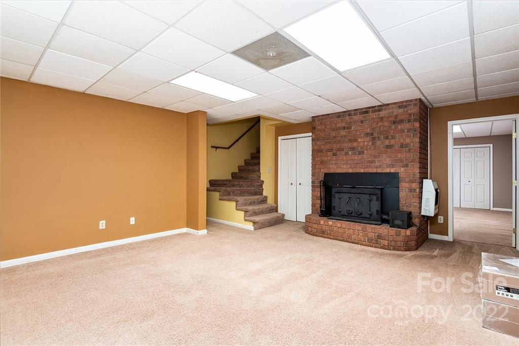 211 Westwood Drive Morganton, NC 28655 - Photo 21 of 43 a view of empty room with a fireplace