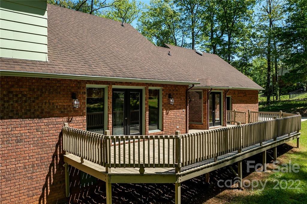 211 Westwood Drive Morganton, NC 28655 - Photo 38 of 43 a view of a house with a wooden deck
