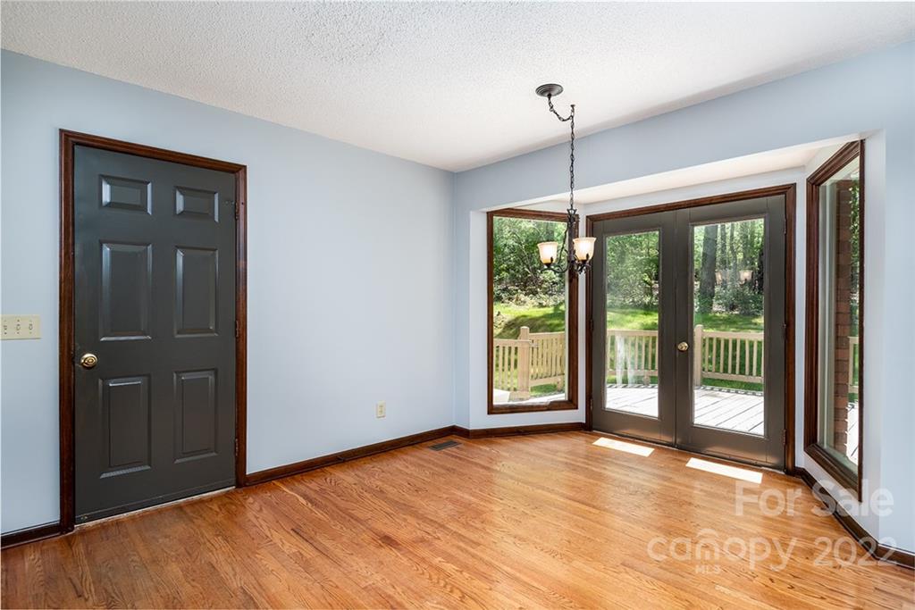 211 Westwood Drive Morganton, NC 28655 - Photo 7 of 43 a view of an empty room with a window