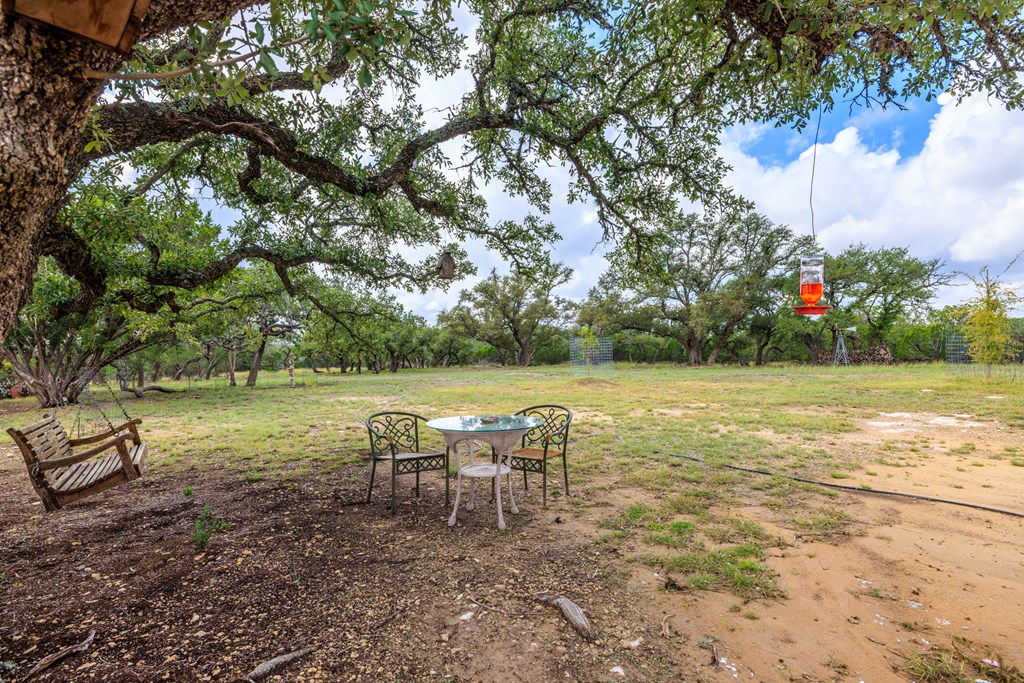 456 Colt Valley Road Fredericksburg, TX 78624 - Photo 24 of 46 a view of a lake with outdoor space