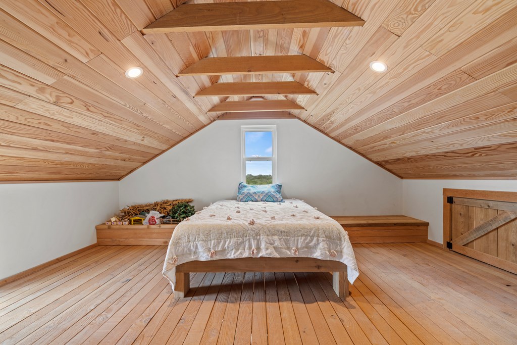 456 Colt Valley Road Fredericksburg, TX 78624 - Photo 27 of 46 a view of entryway with wooden floor