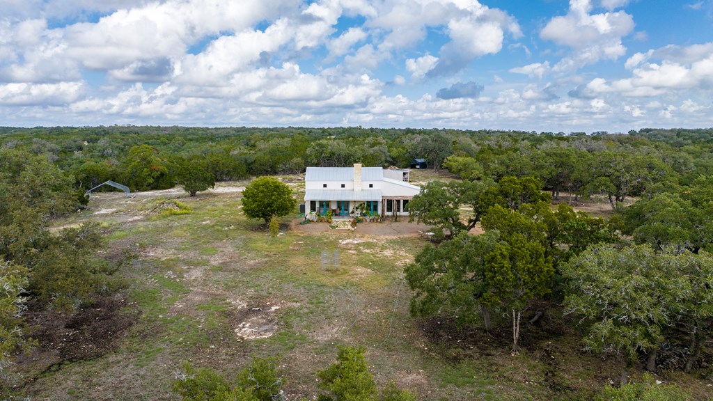 456 Colt Valley Road Fredericksburg, TX 78624 - Photo 41 of 46 a view of a houses with sky view