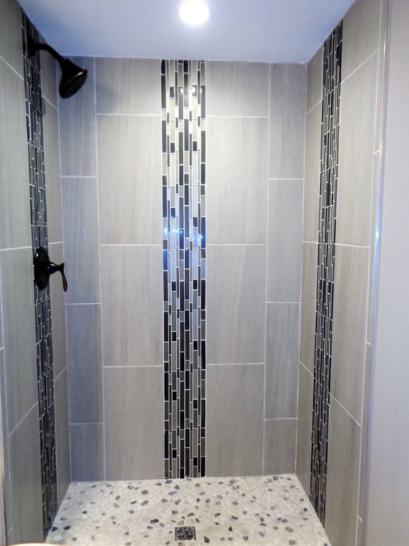 226 Seabury Road Bolingbrook, IL 60440 - Photo 19 of 24 a bathroom with a shower and a sink