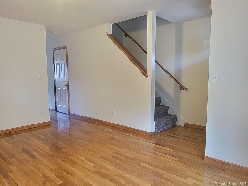 21 Bellevue Avenue, Unit B Vernon, CT 06066 - Photo 6 of 14 a view of an entryway with wooden floor