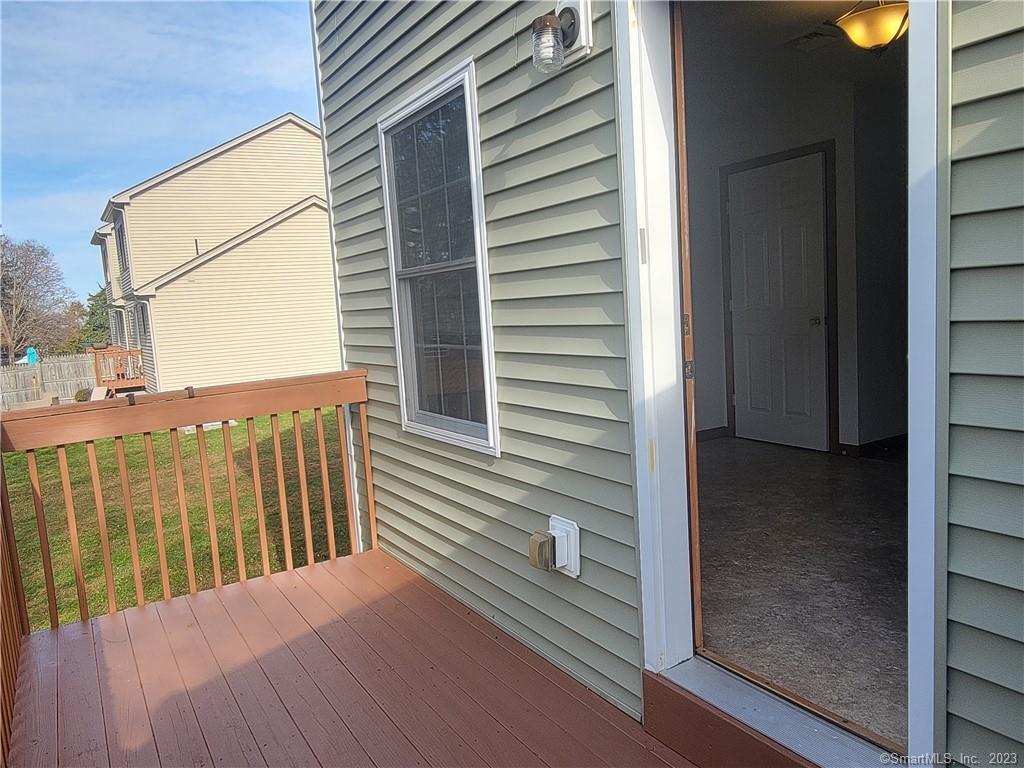 21 Bellevue Avenue, Unit B Vernon, CT 06066 - Photo 8 of 14 a view of a balcony with door
