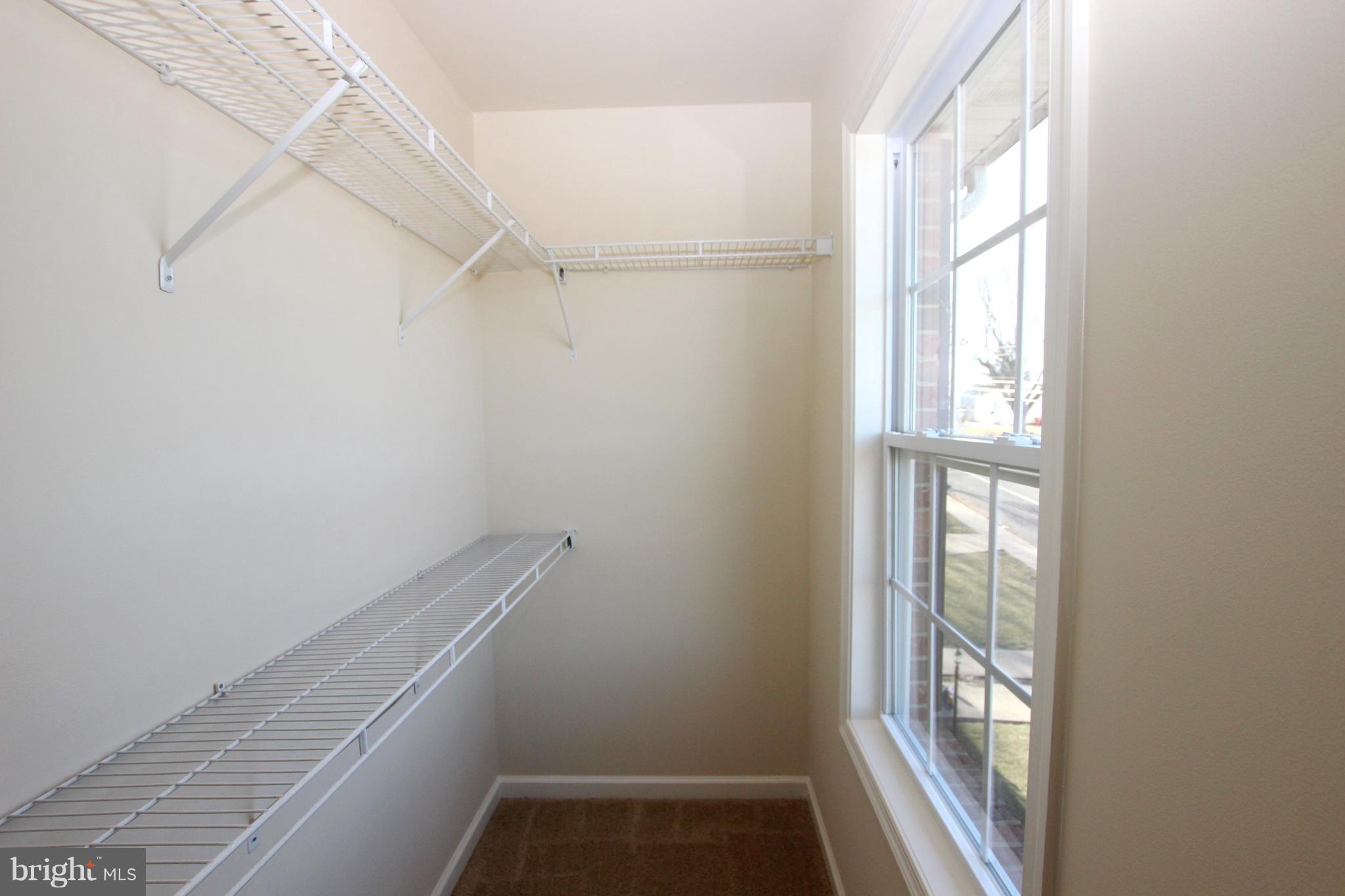 312 East 5th Avenue Ranson, WV 25438 - Photo 13 of 18 a view of small space with racks on the wall
