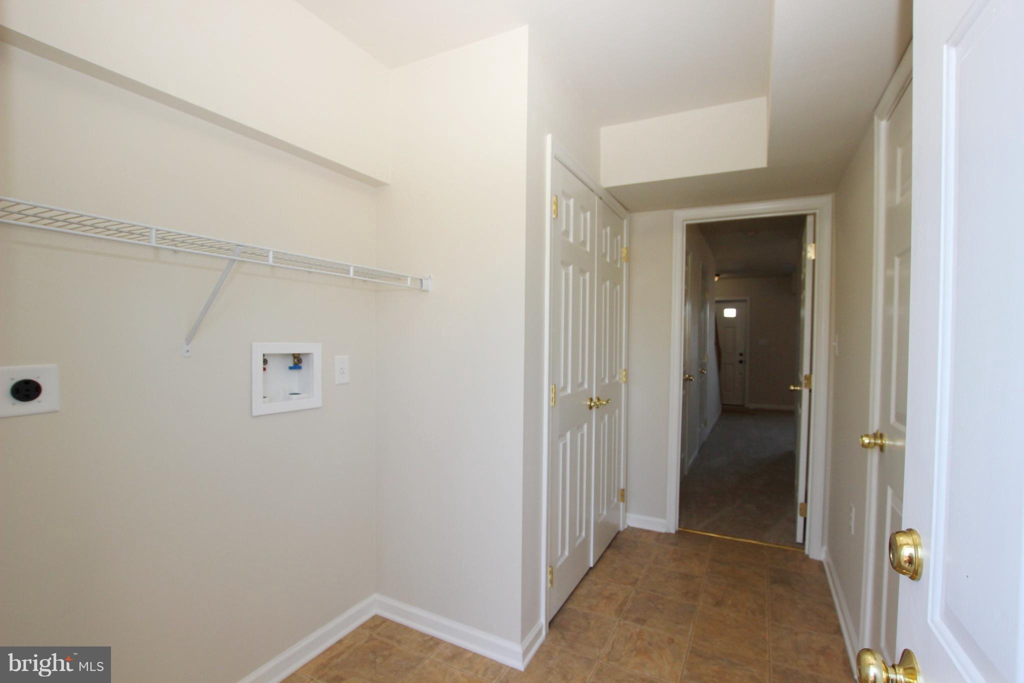 312 East 5th Avenue Ranson, WV 25438 - Photo 3 of 18 a view of a hallway with closet